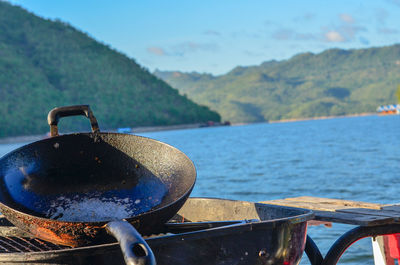 High angle view of meat in lake against sky