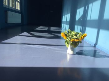 Flowers in vase on table