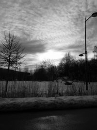 View of snowy field against sky