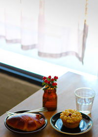 Close-up of fruits served on table at home