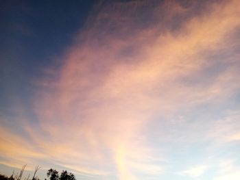 Low angle view of cloudy sky during sunset