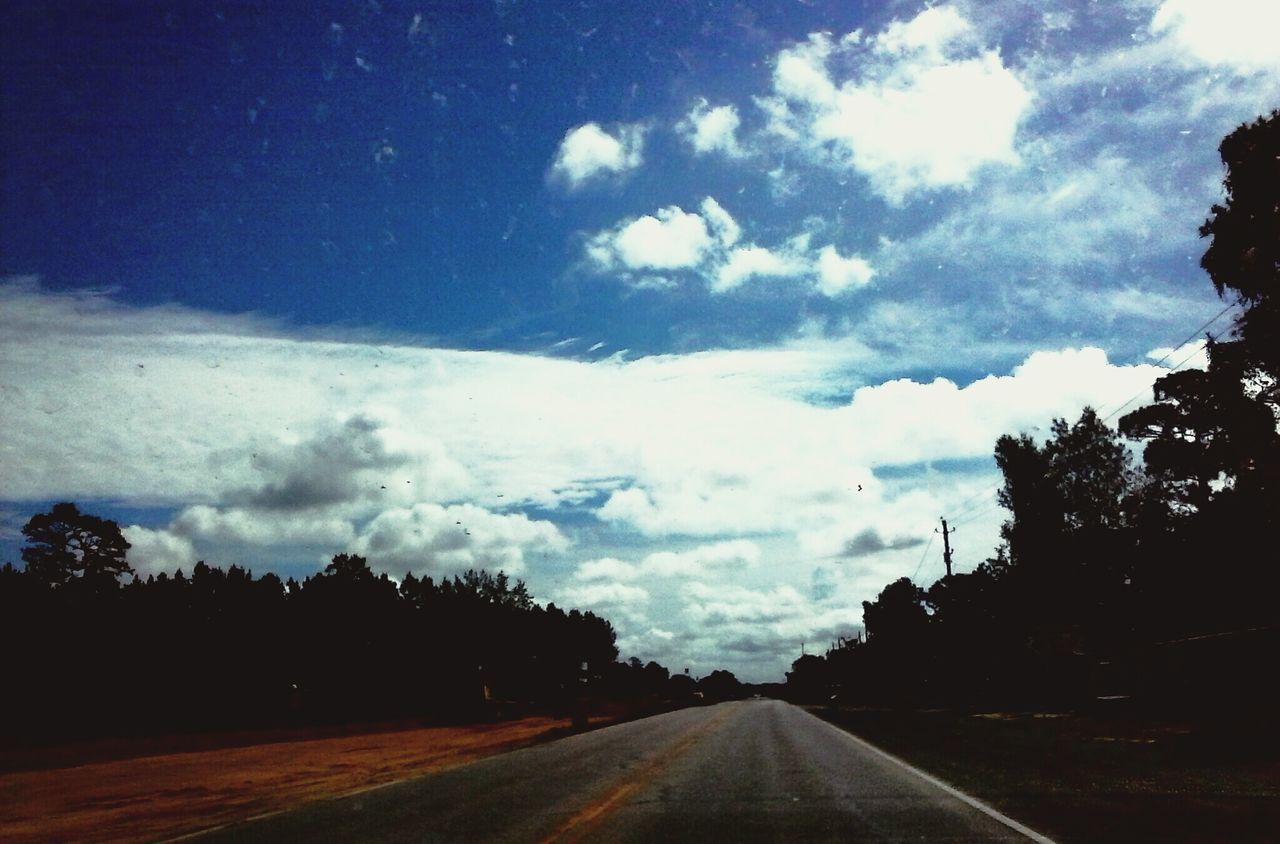 the way forward, road, diminishing perspective, sky, transportation, vanishing point, country road, cloud - sky, tree, empty road, cloudy, tranquility, tranquil scene, road marking, landscape, nature, cloud, empty, scenics, long