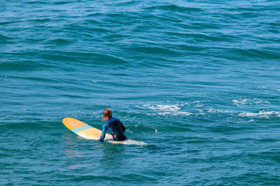 Man surfing in sea