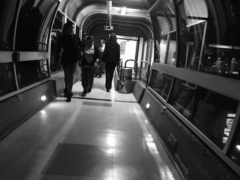 Rear view of people traveling in bus