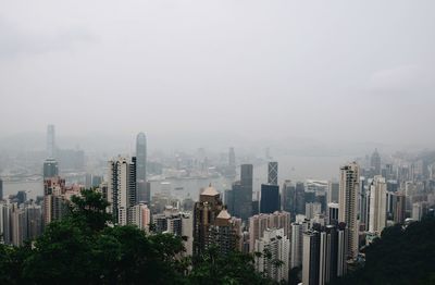 Modern buildings in city against sky