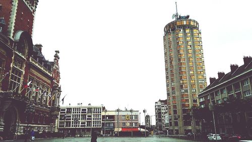 Low angle view of modern buildings against clear sky