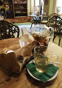 Close-up of tea cups on table in restaurant
