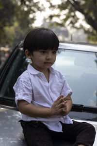 Boy sitting in car