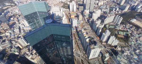 High angle view of modern buildings in city