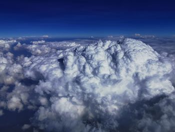 Low angle view of cloudscape against blue sky