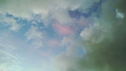 Low angle view of rainbow against sky