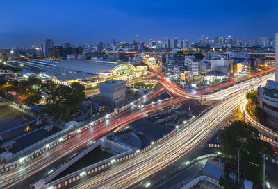 High angle view of illuminated cityscape at night