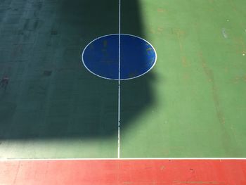 Close-up of green ball on the ground