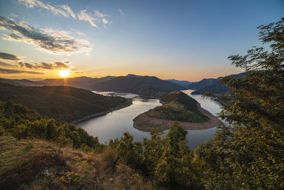 Scenic view of mountains against sky during sunset