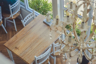 Close-up of empty chairs and table in restaurant