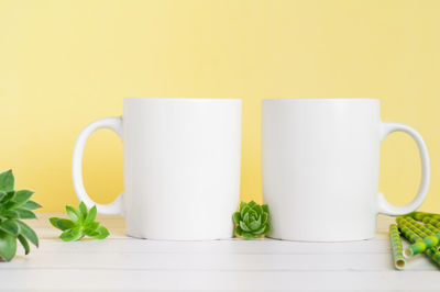 Close-up of coffee cup on table