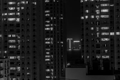 Illuminated buildings in city at night