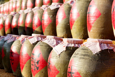 Close-up of pots on shelf