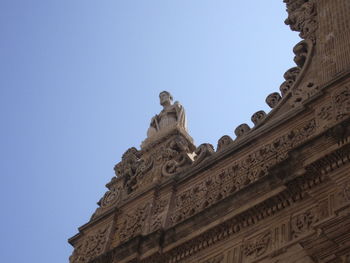 Low angle view of statue of building