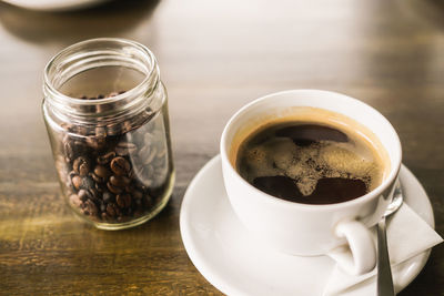 Close-up of coffee cup on table