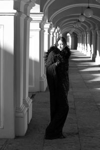 Woman walking in corridor