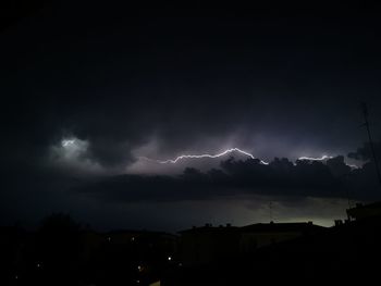 Scenic view of lightning in sky at night