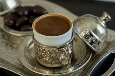 High angle view of coffee cup on table