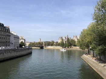 View of bridge over river in city