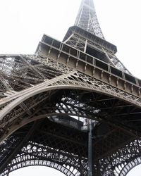 Low angle view of eiffel tower against clear sky