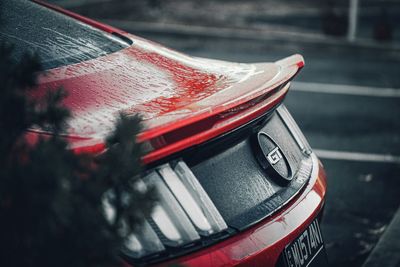 High angle view of red car on road