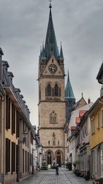 View of buildings against sky in city