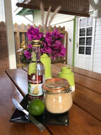 Flower vase on table at home