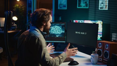 Man using laptop at office