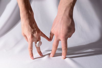 High angle view of hands