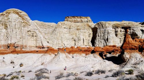 Rock formations against blue sky