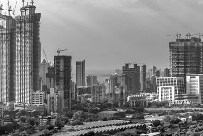 Modern buildings in city against sky in mumbai