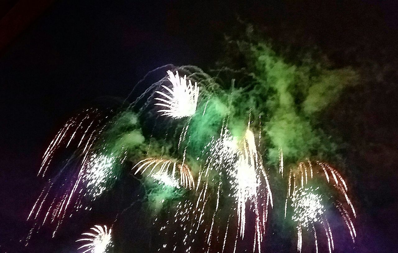 LOW ANGLE VIEW OF FIREWORK DISPLAY