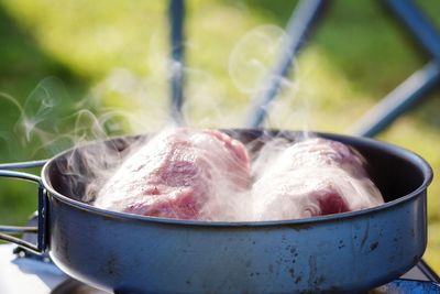 Close-up of meat in container