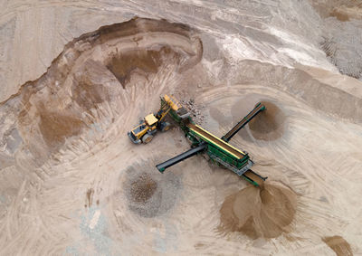 High angle view of motorcycle on rock