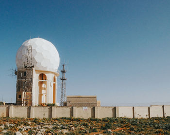 Low angle view of building against blue sky