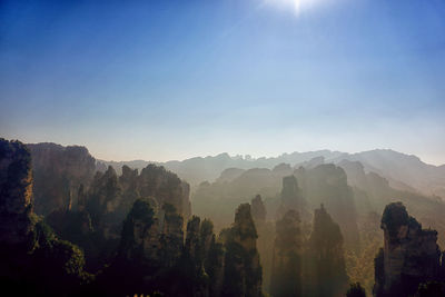 Scenic view of tianzi mountain against blue sky