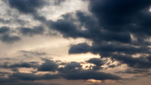 Low angle view of clouds in sky during sunset