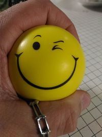 Close-up of woman holding ball