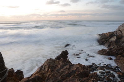 Scenic view of sea against sky during sunset