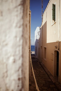 Alley amidst buildings in city