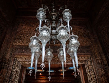 Low angle view of illuminated chandelier