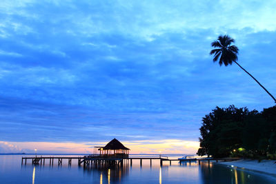 Scenic view of sea against sky at sunset