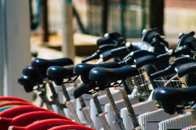 Close-up of bicycle in row