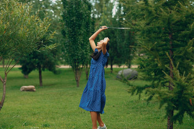 Full length of woman standing on land