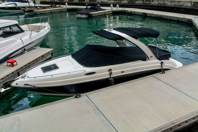 Boats moored on sea